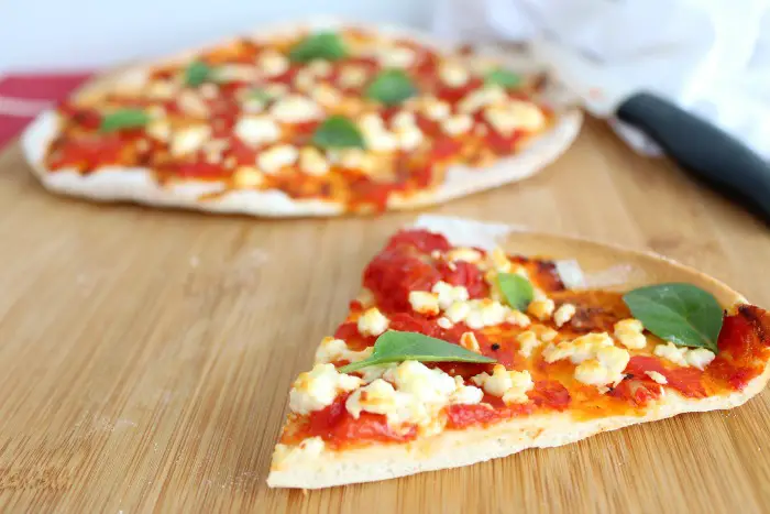 healthy homemade tomato, basil & mozzarella pizza
