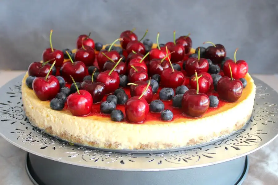 baked vanilla cheesecake with cherry coulis