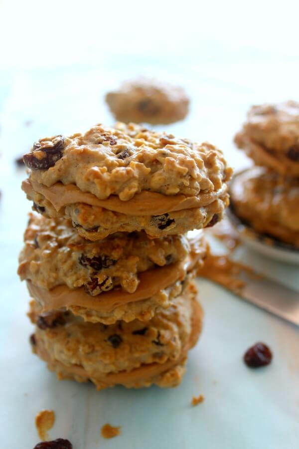 Oaty Raisin Peanut Butter Sandwich Cookies. Healthier oatmeal brown flour & raisin cookies with a peanut butter filling. A delicious snack or tea time treat. Your kids will love these! | berrysweetlife.com