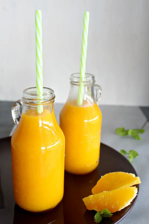 Mango Orange and Ginger Hot Smoothie. A fruity, healthy & tasty hot smoothie for chilly mornings. Your whole family will love these! | berrysweetlife.com