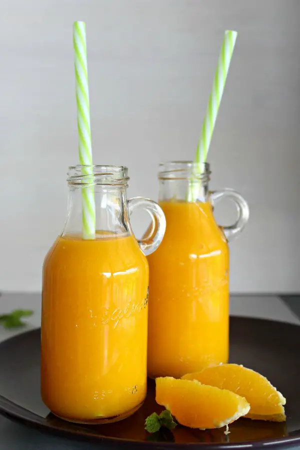 Mango Orange & Ginger Hot Smoothie. A fruity, healthy & tasty hot smoothie for chilly mornings. Your whole family will love these! | berrysweetlife.com