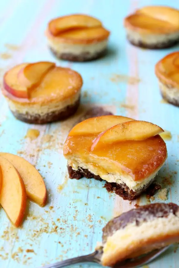 Mini Lemon & Ginger Cheesecake with Peach Coulis. Easy dessert recipe. Delicious creamy melt in the mouth baked fruit cheesecakes. Makes 16. You will love this recipe! | berrysweetlife.com