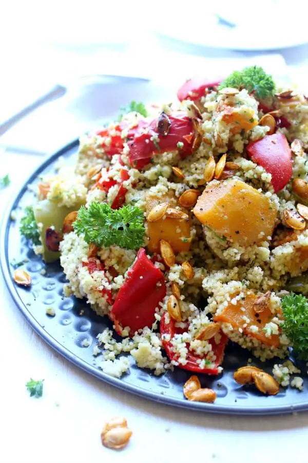Roasted Butternut Squash Cous Cous Salad with Pesto Dressing. An easy, healthy vegetarian salad that is bursting with colour and flavour. You can't go wrong with this healthy dish! | berrysweetlife.com