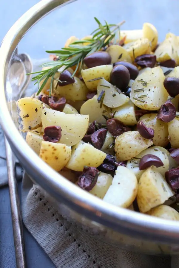 Black Olive Rosemary New Potato Salad. An easy going salad that is simple to make, healthy & delicious! Everyone will be asking for the recipe! | berrysweetlife.com