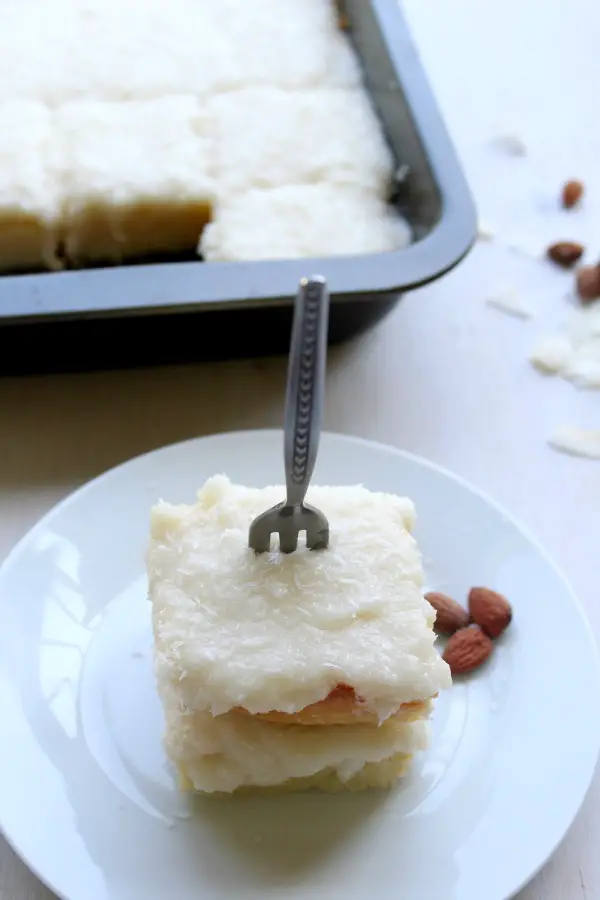 Coconut Almond Greek Yoghurt Sheet Cake. An easy cake recipe that's perfect for Easter Sunday or any special occasion. Kids & adults will love this cake! | berrysweetlife.com