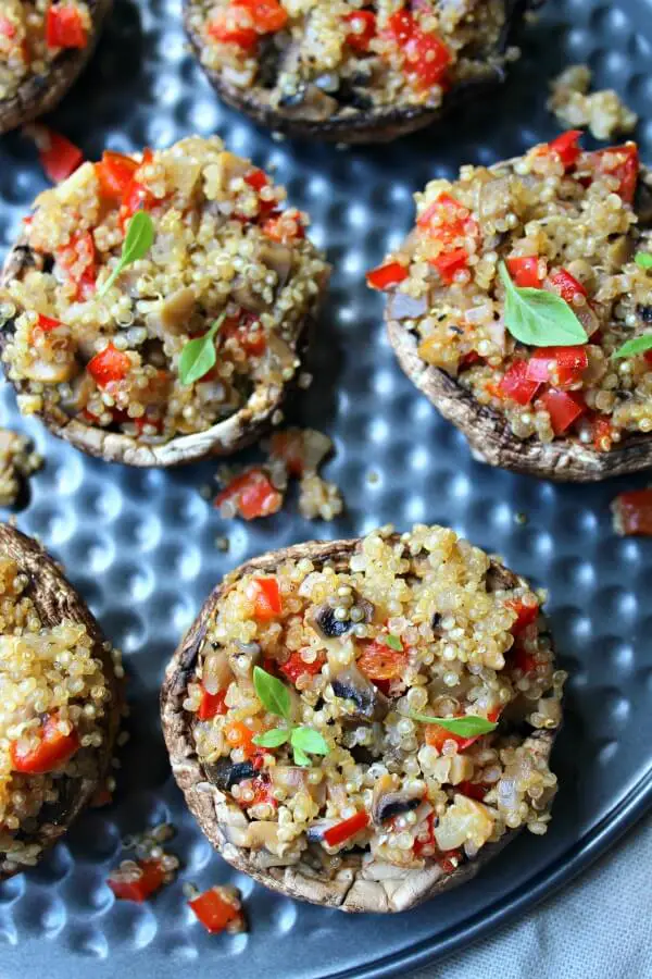 Pepper Quinoa Stuffed Giant Mushrooms. Fragrant, delectable & oh so healthy! Perfect as a side dish or a light meal they take only 35 minutes to make! | berrysweetlife.com