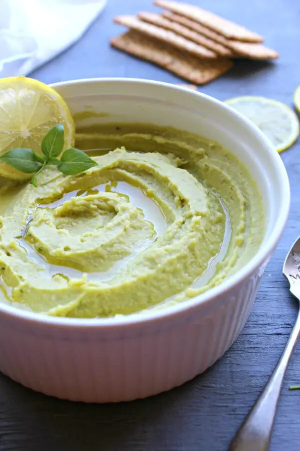 5 Minute Avocado Basil Hummus. Got 5 minutes? Make this healthy, tasty hummus. It goes with crackers, sandwiches, wraps or pasta | berrysweetlife.com