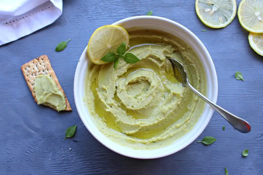 5 Minute Avocado Basil Hummus. Got 5 minutes? Make this healthy, tasty hummus. It goes with crackers, sandwiches, wraps or pasta | berrysweetlife.com