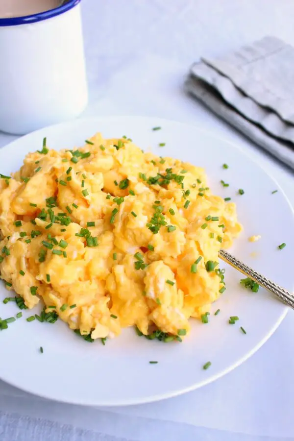 How To Make Perfect Scrambled Eggs. In 4 simple steps you will have CREAMY, bright yellow, delicious scramble EVERY time!! | berrysweetlife.com
