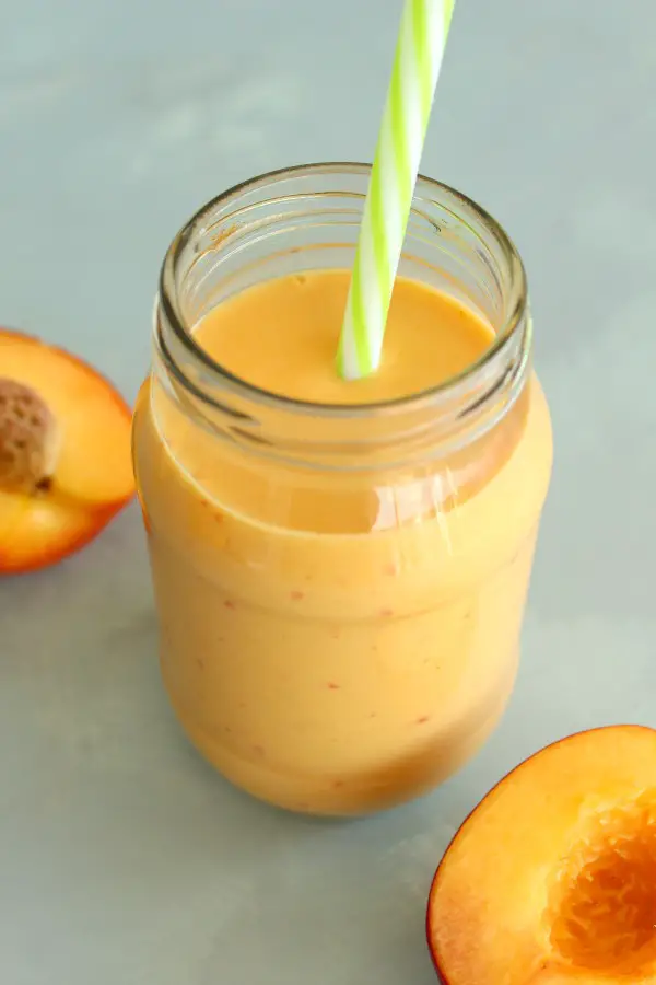 Post Workout Tropical Turmeric Smoothie. The absolute BEST tropical fruit smoothie made with 4 fruits and Greek yoghurt or coconut milk - packed with vitamins, minerals, protein and energy! | berrysweetlife.com