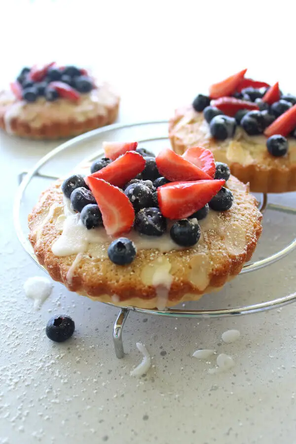 Mini Classic Berry Apricot Almond Tarts recipe - easy to make with ground almonds and shortcrust pastry for a tea time treat or a delicious French dessert! | berrysweetlife.com