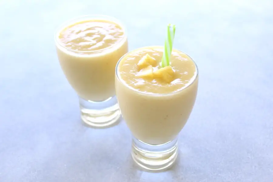 Delicious, healthy, creamy pineapple fruit smoothie made with or without yoghurt. Have a tropical island breakfast with this Pina Colada Pineapple Smoothie! | berrysweetlife.com
