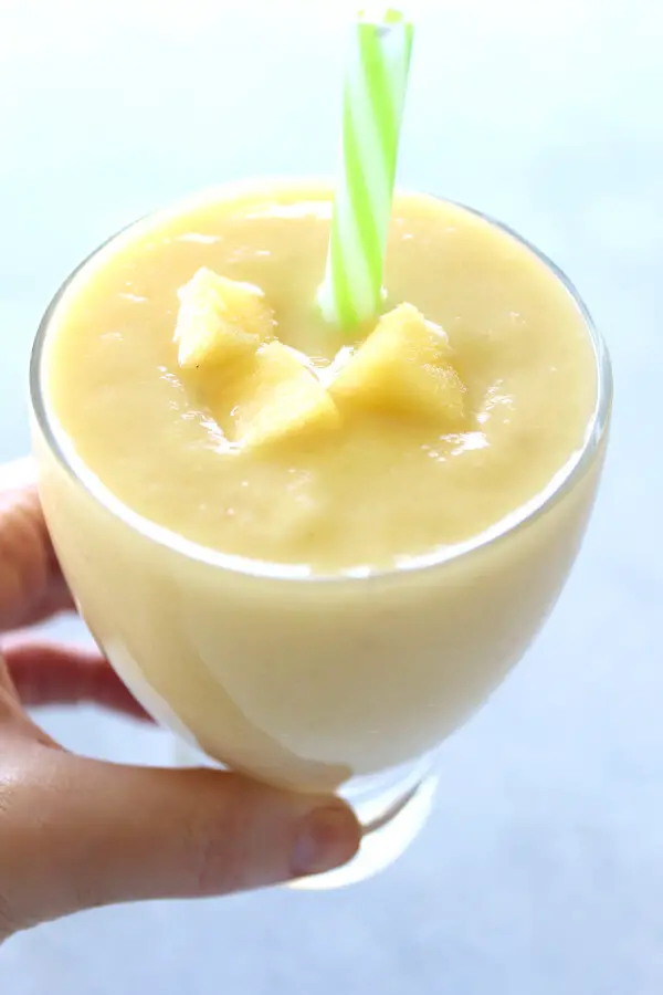 Delicious, healthy, creamy pineapple fruit smoothie made with or without yoghurt. Have a tropical island breakfast with this Pina Colada Pineapple Smoothie! | berrysweetlife.com
