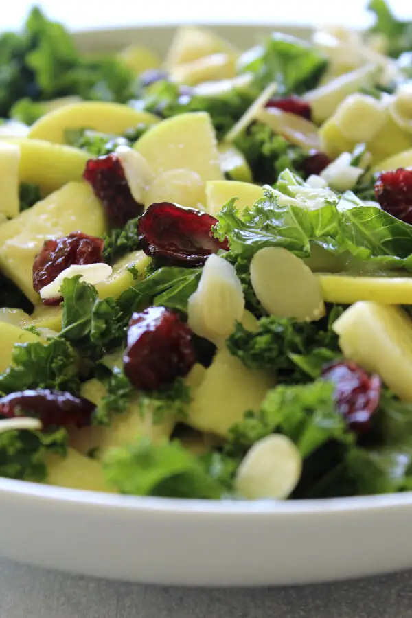 Super healthy, crunchy and tasty Kale Apple Cranberry Salad With Sesame Dressing is quick and easy to make, the ideal side dish for any occasion | berrysweetlife.com