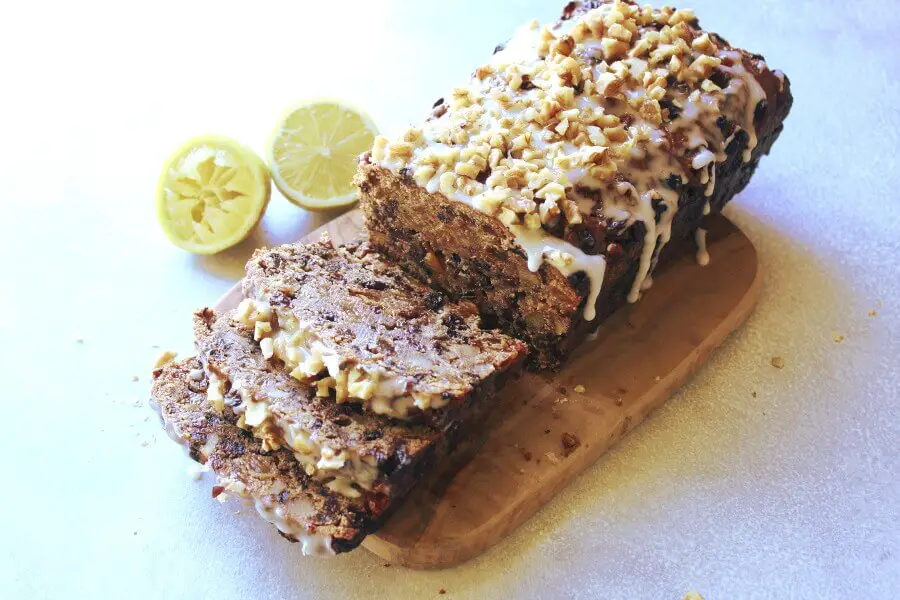 Moist, easy to make fruit and nut loaf recipe with a twist! This Walnut Fruit Loaf With Lemon Icing is the best combination of flavours, enjoy a slice with a cup of tea or coffee! | berrysweetlife.com