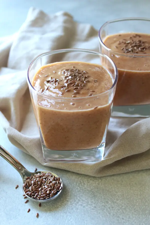 Add protein, fibre, antioxidants and omega 3 to your diet with this tropical fruit vegan Energy Boost Flax Seed Smoothie! | berrysweetlife.com