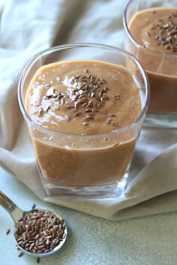 Add protein, fibre, antioxidants and omega 3 to your diet with this tropical fruit vegan Energy Boost Flax Seed Smoothie! | berrysweetlife.com