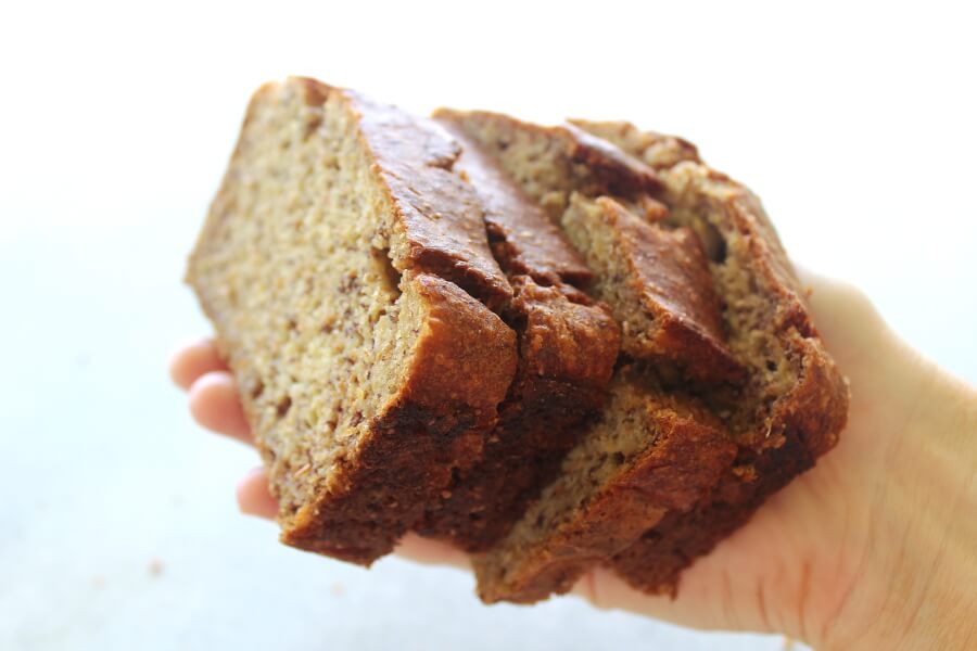 A Completely Healthy Banana Bread recipe that is super moist and delicious! This recipe has no sugar, healthy fats, wholewheat flour, and is more “banana with a little bread than bread with a little banana!” | berrysweetlife.com