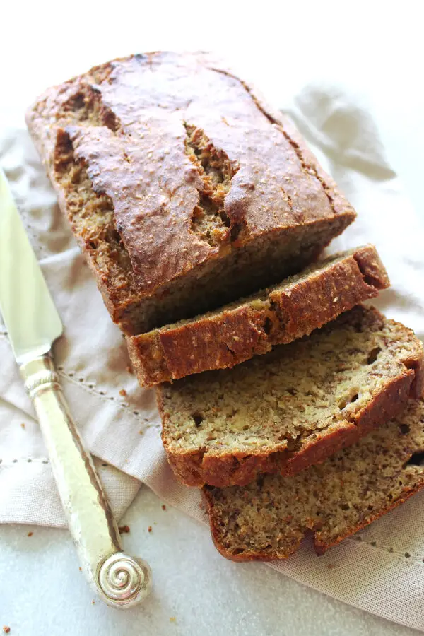A Completely Healthy Banana Bread recipe that is super moist and delicious! This recipe has no sugar, healthy fats, wholewheat flour, and is more “banana with a little bread than bread with a little banana!” | berrysweetlife.com