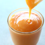 A vegan, easy to make Nourishing Mango Papaya Ginger Smoothie made with just 4 ingredients and your blender in 5 minutes! It tastes wonderful, is silky smooth, overflowing with healthy goodness | berrysweetlife.com
