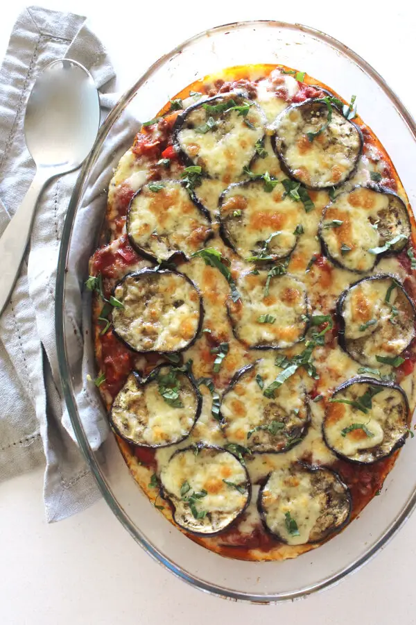 A delicious layered eggplant and mince bake topped with cheese. This is called a Cheats Healthy Beef & Brinjal Moussaka because it’s SO easy to make! | berrysweetlife.com
