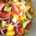Refreshing, tasty Summer Fiesta Mango Avocado Red Onion Salad! Easy to prepare, vegan, raw, low carb and packed full of healthy goodness! | berrysweetlife.com